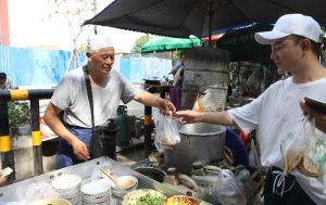 Buy breakfast at the morning market