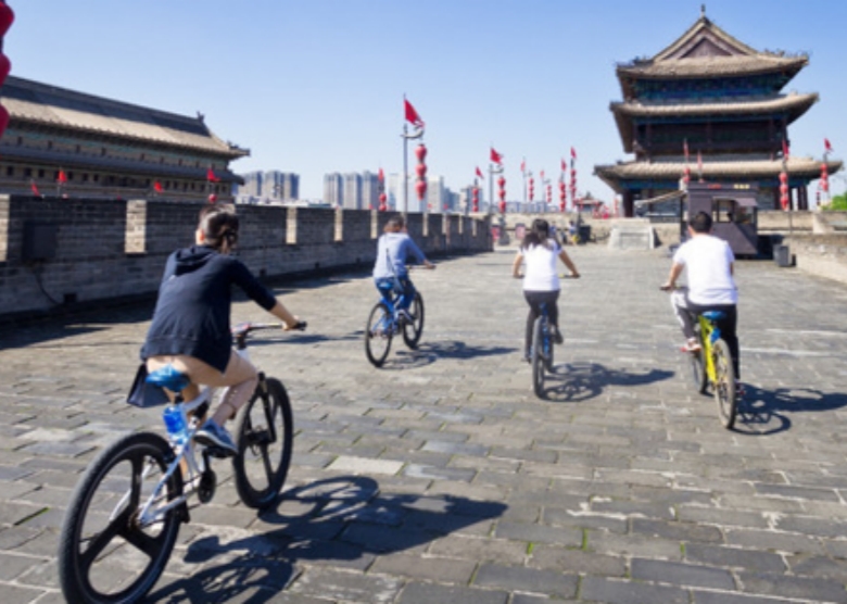 cycle on the city wall