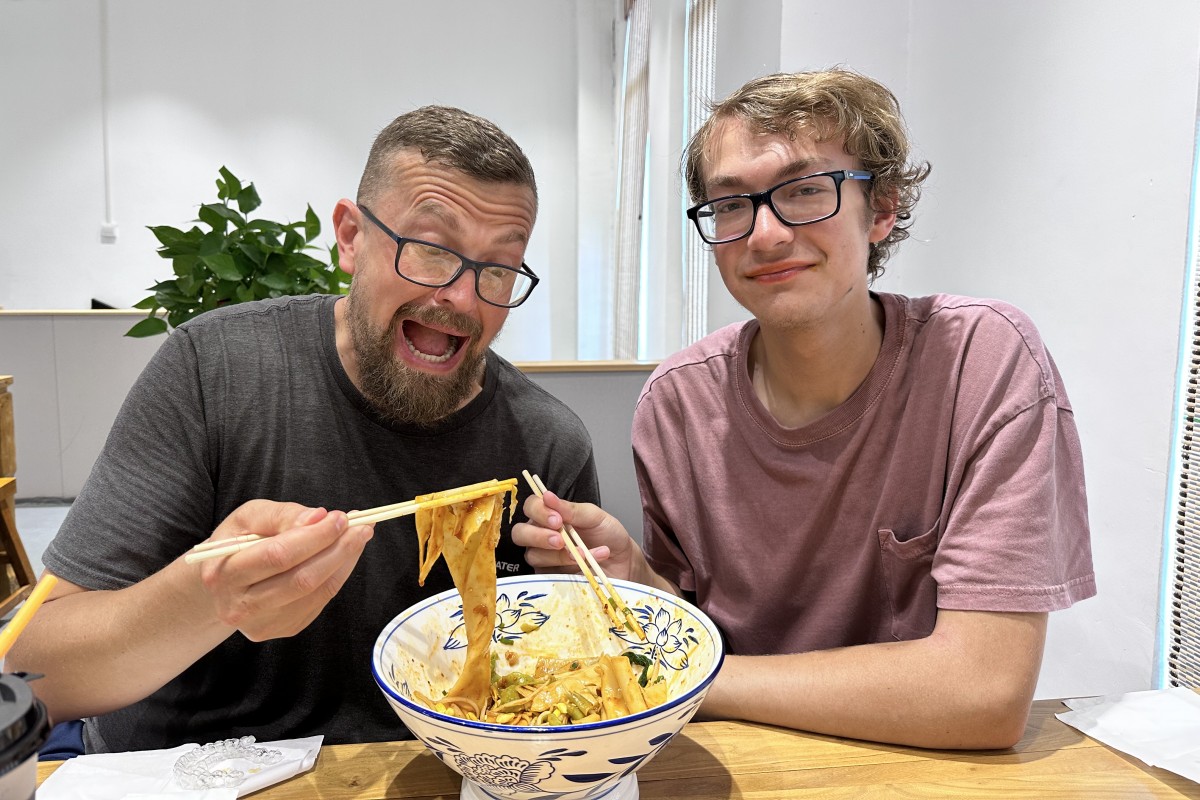 Our clients are enjoying Biangbiang noodles in Xian