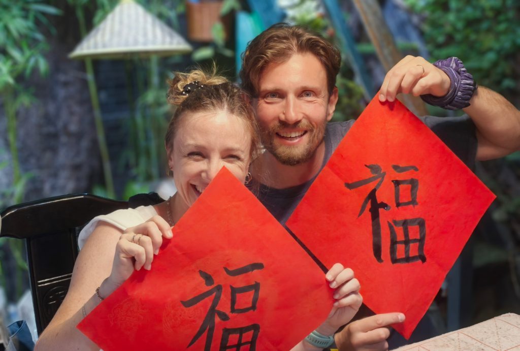 Visitors display calligraphy works