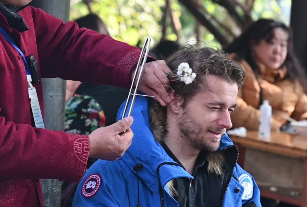 International Tourists Experience Ear Cleaning
