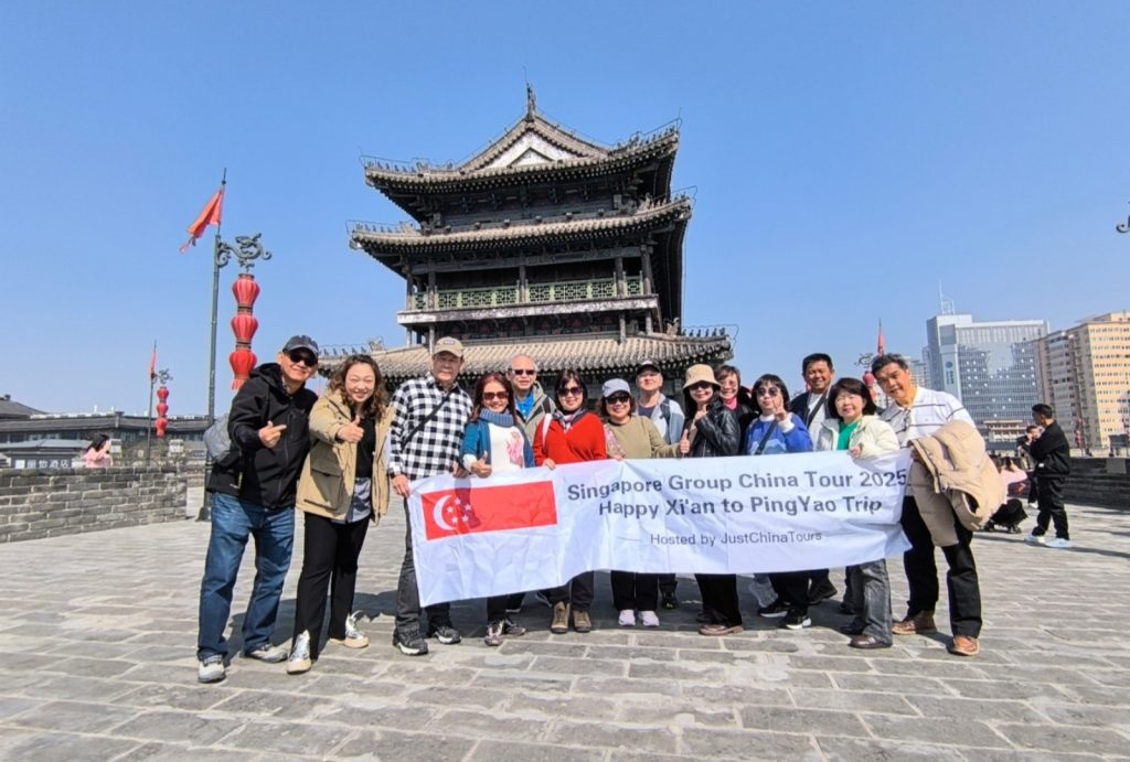 Singapore Group China Tour—Guests pose for a group photo on the city wall