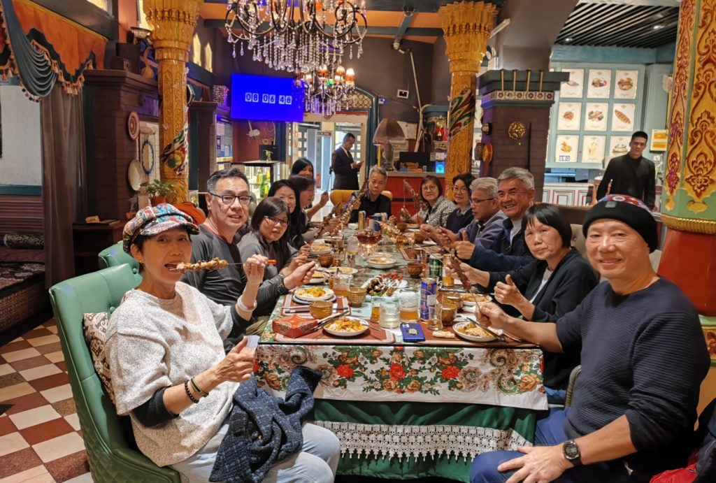 Our guests enjoy local food in Kashgar