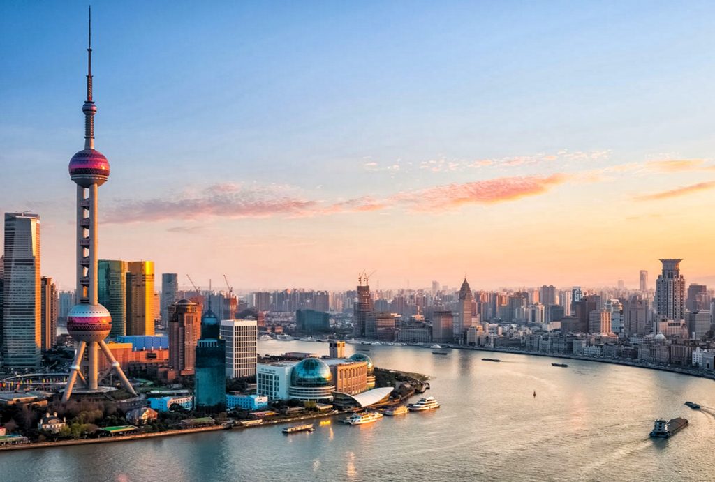 Aerial sunrise view of Shanghai Lujiazui and Huangpu River from Puxi