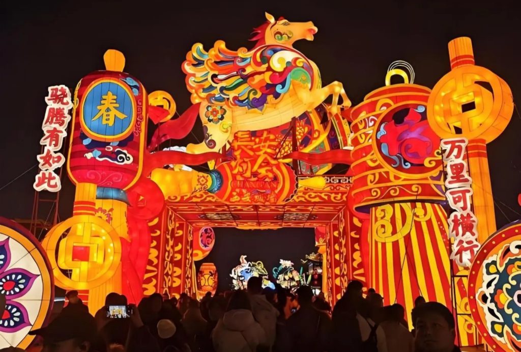 Colorful flying horse lantern arch, crowded visitors at Chang'an Lantern Show