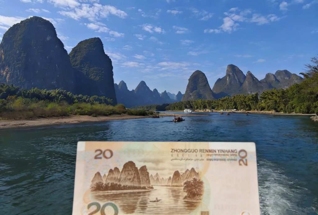Compare the landscape printed on the 20 RMB note with the real scenery along the Li River.