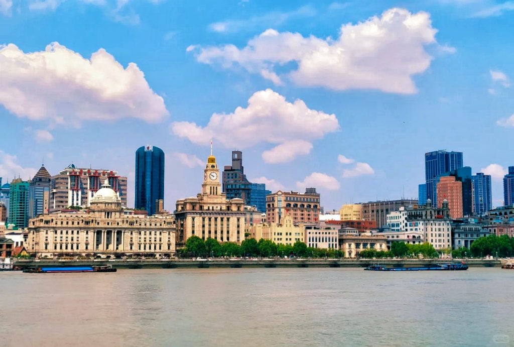 Daytime view of Shanghai Bund historic architecture from Huangpu River