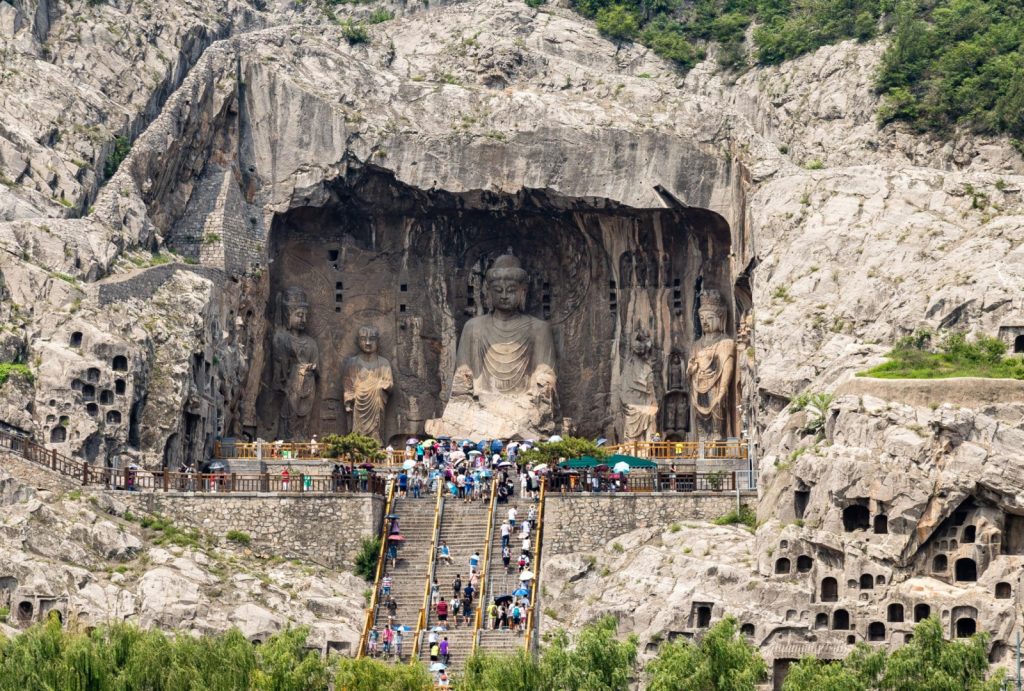 Longmen Grottoes Buddhist statues along the Yi River in Luoyang